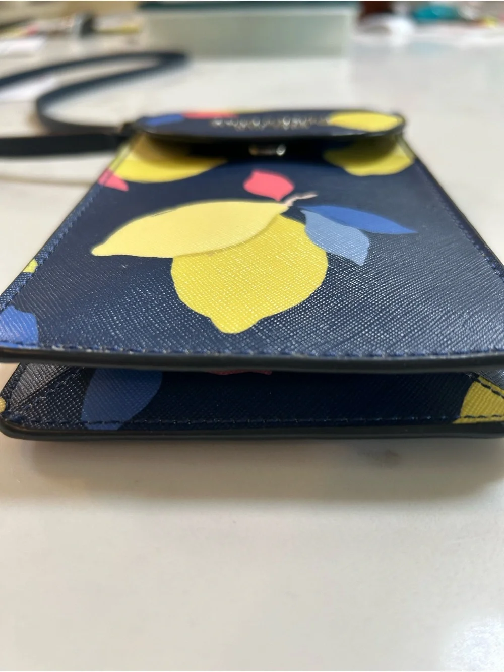 kate spade navy lemon print crossbody with pink and blue accents